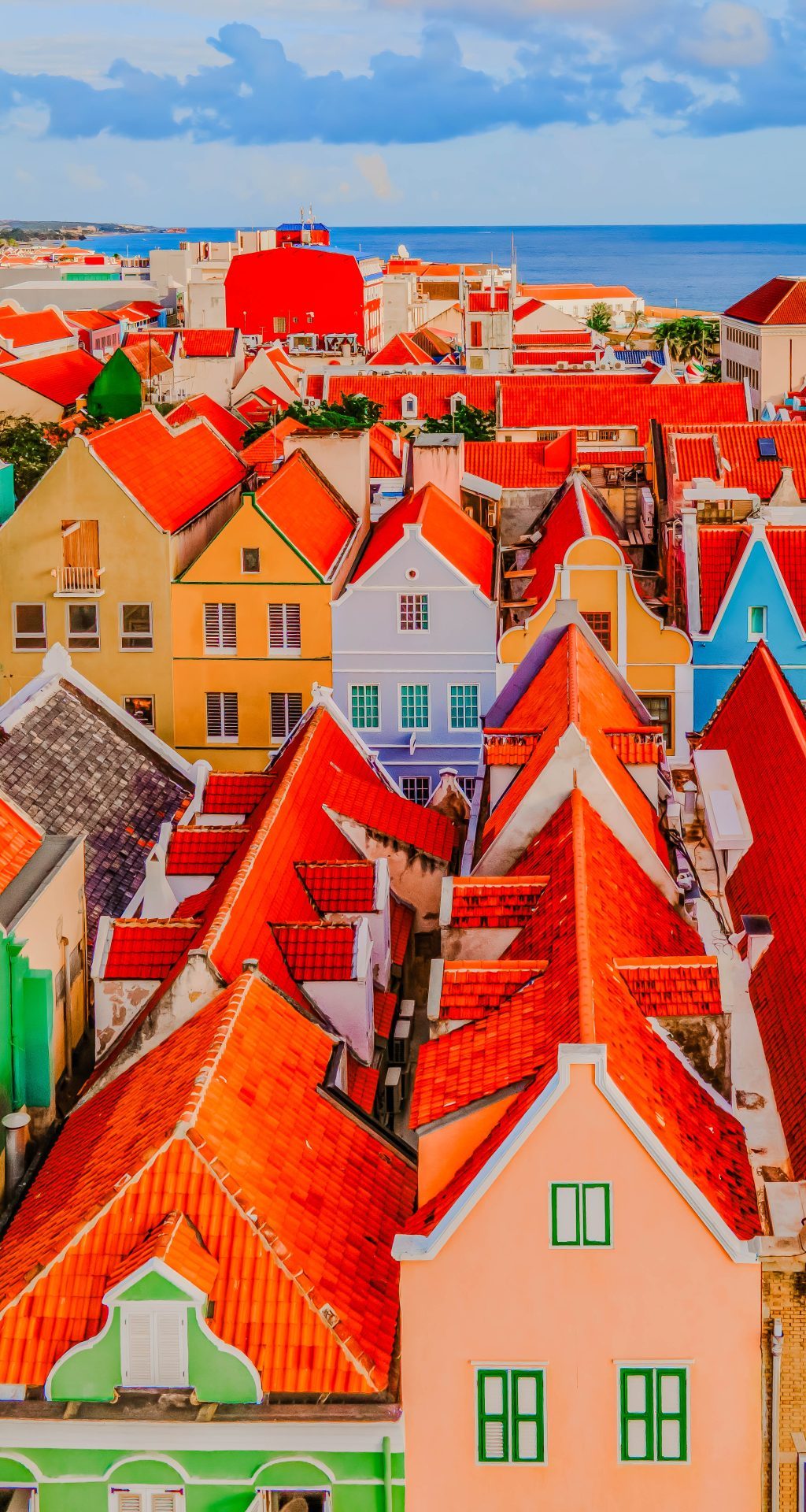Willemstad, Curacao Dutch Antilles. Colorful Buildings attract tourists from all over the world. Blue sky sunny day Curacao Willemstad, close up of colorful houses of Curacao